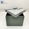Бумажная коробка изготовленной на заказ серой картонной роскошной коробки упаковывая бумажную коробку с лентой